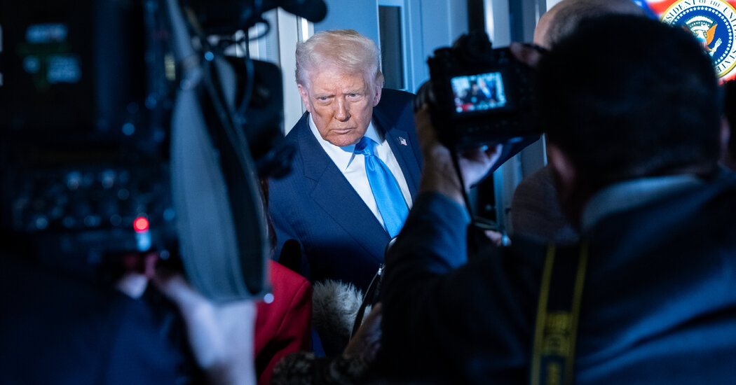 Protesters demonstrate against global tariffs in front of the Supreme Court building.